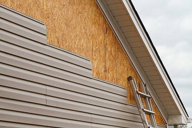 Professional Siding Replacement technician working in Sun City Center, FL